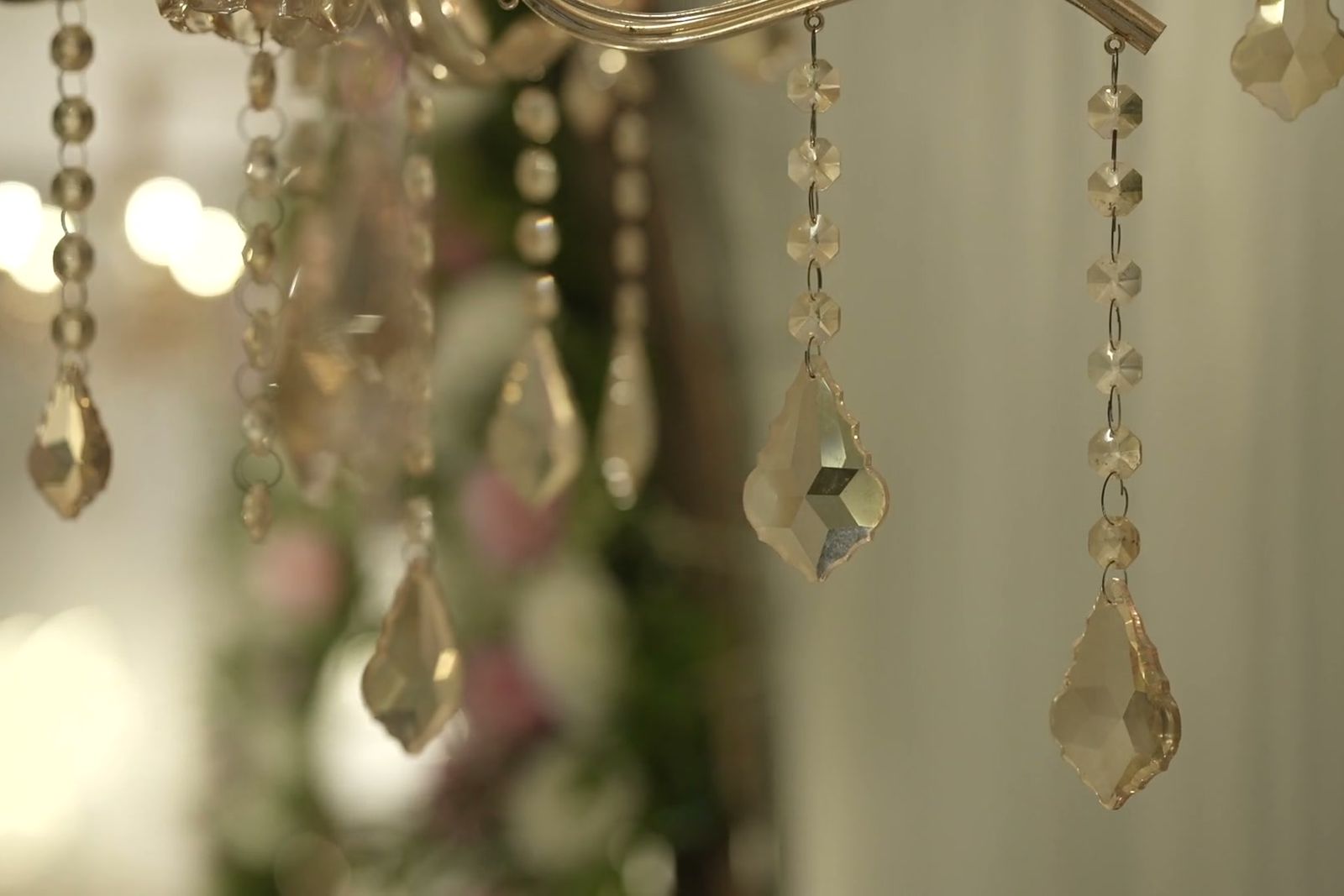 Crystal chandeliers held in shallow focus.